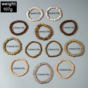 Detail of 11-piece bohemian beaded bracelet set with mixed textures and 5.5cm inner diameter