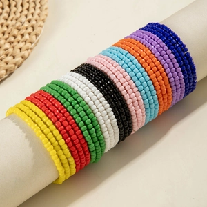 Detailed set of 10 colorful seed bead bracelets in vibrant bohemian stacking design