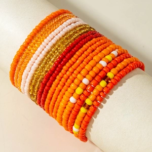 Detail of colorful multi-layered bohemian beaded bracelets on a display stand
