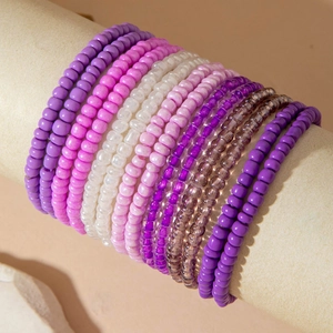 Detailed macro view of Bohemian style colorful beaded bracelets set in various colors