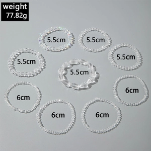 Detailed view of 9-piece bohemian beaded bracelet set in iridescent glass with size labels