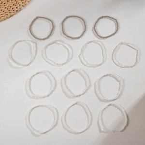 13-piece bohemian seed bead bracelet set in white and silver colors for layering