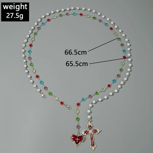 Detail of vintage double-layer necklace with cross heart pendant and length specs