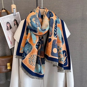 Sciarpa invernale in finto cashmere con stampa botanica arancione e blu e frange grigie