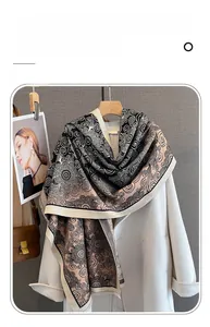 Detailed pattern of imitation cashmere scarf with spiral and cloud totems in neutral tones