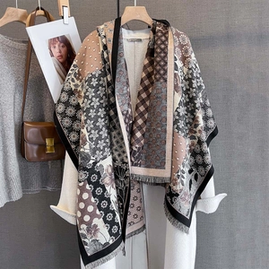 Fall floral plaid patchwork scarf with fringes styled over a white wool coat