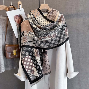 Plaid and floral print oversized autumn winter scarf with tassels over a white coat