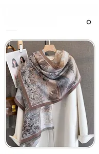 Detail of imitation cashmere scarf featuring retro tapestry pattern and soft fringes