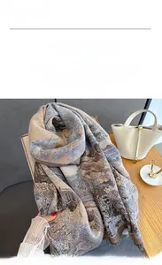 Detail of imitation cashmere scarf featuring oil painting print and fringed edges