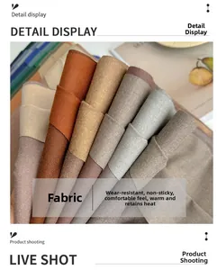 Detail of warm double-sided cashmere-feel fabric in various earth-tone colors