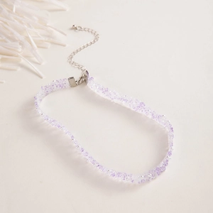 Detail of beaded choker necklace with purple beads and silver adjustable lobster clasp