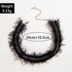 Detail of 34cm black feather choker necklace with silver chain and lobster clasp