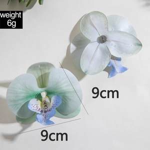 Detailed back and front view of 9cm blue-green gradient orchid earrings with metal screw