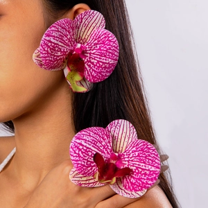 Detailed view of 3D orchid earrings and ring set with purple striped petals and matte finish