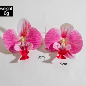 Detail showing pink orchid earrings petals with 9cm diameter size and 6g weight info