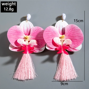 Detail view of pink orchid tassel earrings showing 15cm length and 12.8g weight