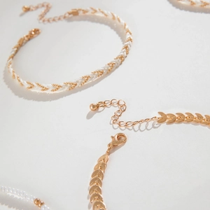 Bohemian multilayer starfish anklet set with white beads and leaf charms for women