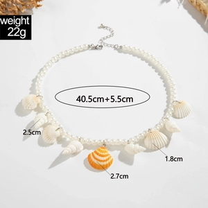 Ocean-themed pearl necklace featuring seashell and striped scallop pendants with dimensions