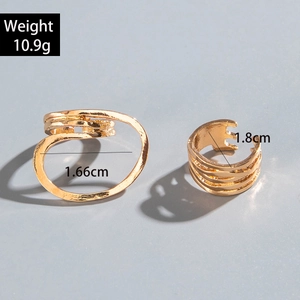 Detailed view of two irregular hollow gold ring sets showing 1.66cm and 1.8cm diameters