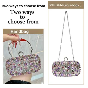 Luxurious evening clutch featuring pink and purple rhinestones with a metal ring handle
