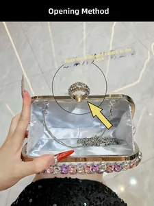 Detail showing ring clasp set with zircons and the push-back opening mechanism on clutch