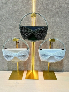 Luxury rhinestone bow evening handbags in black, champagne, and silver with metal handles