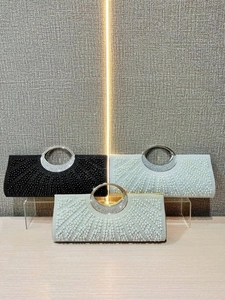 Sparkling evening clutch bags with pearl and rhinestone inlay on metal ring handles