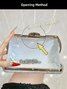 Macro shot of silver crystal clutch bag interior with light blue lining and chain strap