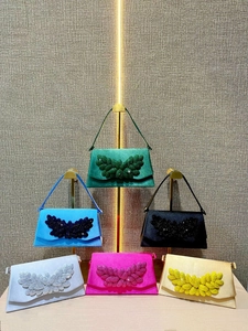 Elegant satin evening clutch bags with sparkling rhinestone leaf design in multiple colors