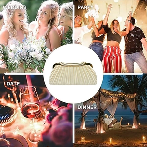 Detail of elegant pleated evening clutch bag with diamond-studded gold metal frame