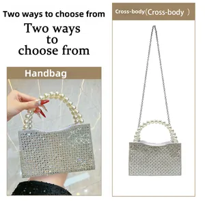 Detail view of sparkly rhinestone evening bag with pearl handle and metal chain strap