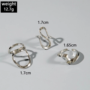 Macro detail of silver minimalist rings with weight and size specifications in view