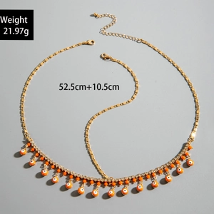 Détail de la chaîne de tête Evil Eye dorée avec fermoir mousqueton et chaîne d'extension
