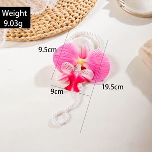 3D printed pink orchid and pearl finger chain ring with size measurements for vacation