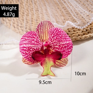 Detail of 3D printed orchid flower head with realistic texture and pearl decoration