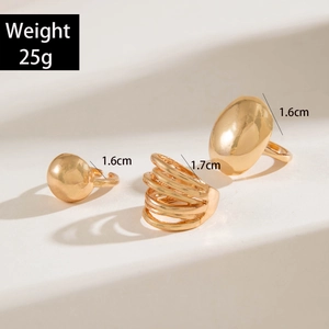 Detailed view of gold geometric rings set with 25g weight and size specifications