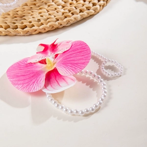 3D printed pink orchid and white pearl ring featuring a sweet tropical resort style