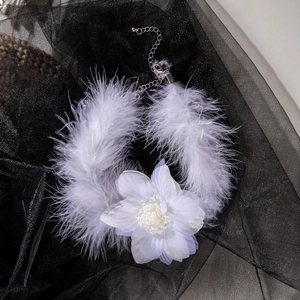 Elegant white feather choker necklace featuring a central 3D fabric flower detail