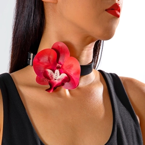 Detailed close-up of a realistic red orchid flower choker with a black leather neckband