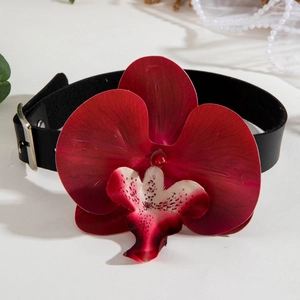 Detailed view of elegant black choker with realistic dark red orchid flower and pearls