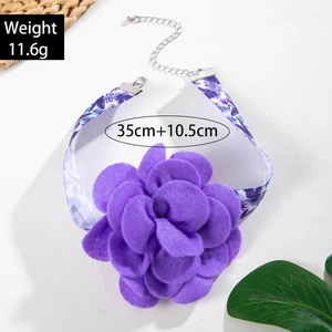 Detail view of purple fabric flower choker with 35cm floral ribbon and metal lobster clasp