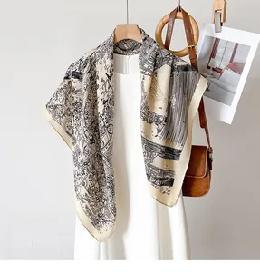Détail d'un foulard en soie avec imprimé ville classique sur un cintre avec sac