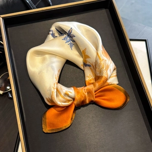 Luxurious 100% mulberry silk scarf with blue botanical prints and orange borders