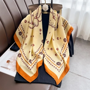 Elegant cream rose print silk scarf with orange borders and pearl chain pattern details