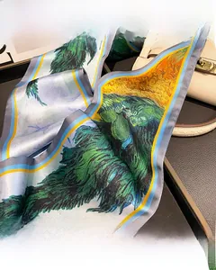 Detail showing impressionist oil painting pattern on silk twilly tied to a handbag