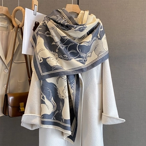 Luxurious navy blue and beige cashmere scarf with horse print and tassels for winter