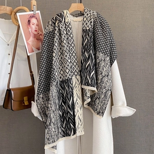 Women's autumn scarf with geometric textures in black, white, and beige tones