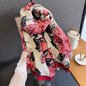 Elegant beige cashmere-feel shawl with pink floral patterns and fringe edges