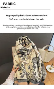 Detail of cashmere-like scarf with floral and bird prints on a wooden surface
