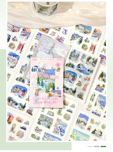 Vista dettagliata di 20 adesivi per scrapbooking invernali con motivi di neve e pinguini